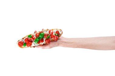 Kızarmış ekmek, krem peynir ve beyaz arka planda izole edilmiş domatesli sandviç. İtalyan bruschetta 'sı. Yüksek kalite fotoğraf