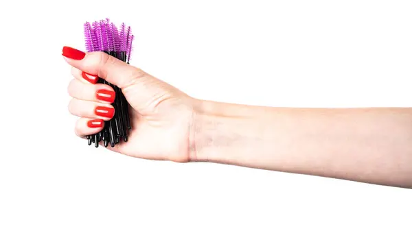 stock image Cosmetic brushes for eyelashes and eyebrows on a white background. Lash brush isolated. Lash brush in hand. High quality photo