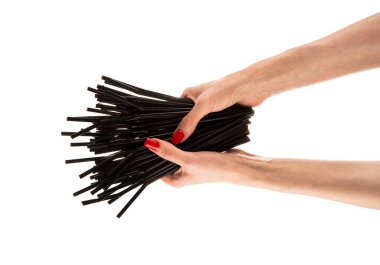 Siyah pipetler beyaz arka planda izole edilmiş ellerde. Yüksek kalite fotoğraf