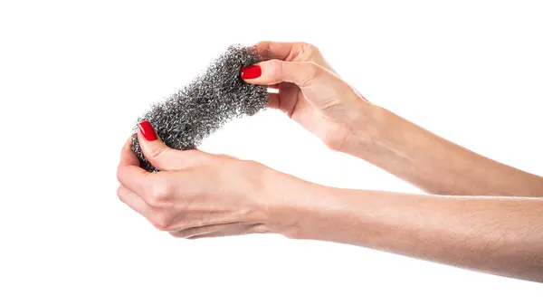 stock image Metal kitchen sponge in the hand isolated on a white background . High quality photo