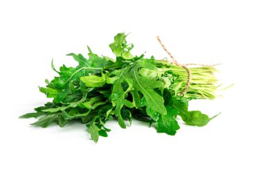Arugula beyaz arka planda izole edilmiş. Bir demet roka. Yüksek kalite fotoğraf