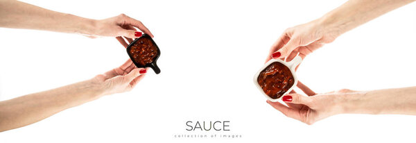 Bowl with red sauce isolated on white background. High quality photo