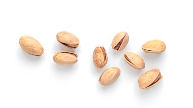 Beyaz arka planda fıstıklar. Yüksek kalite fotoğraf