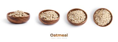 Beyaz arka planda izole edilmiş ahşap bir kasede yulaf ezmesi. Yüksek kalite fotoğraf