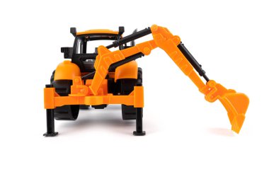 Traktör. Kazıcı. Sınıf. Çocuk oyuncağı. Beyaz arka planda çocuk oyuncağı. Yüksek kalite fotoğraf