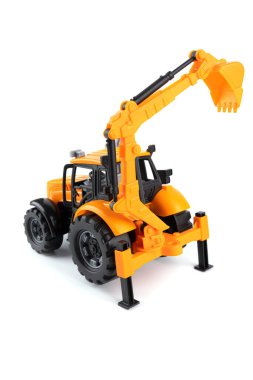 Traktör. Kazıcı. Sınıf. Çocuk oyuncağı. Beyaz arka planda çocuk oyuncağı. Yüksek kalite fotoğraf