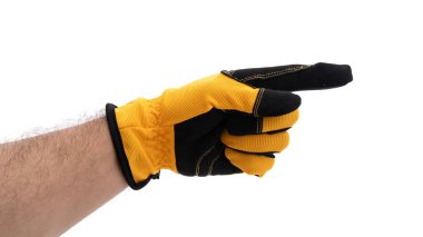 Sarı ve siyah kumaştan yapılmış bir iş eldiveni belirgin bir şekilde sergilenirken, el sağ tarafı işaret ediyor. Bu, görev sırasında rehberlik veya talimat önerir.