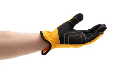 Siyah ve sarı bir iş eldiveni, dayanıklı tasarımını gösteren bir el tarafından tutuluyor. Tutma ve koruma gerektiren çeşitli görevler için idealdir. Açık havada çalışmak için mükemmeldir..