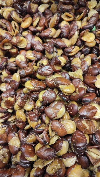 stock image nuts seeds are scattered in the supermarket for sale, food, spoon. High quality photo