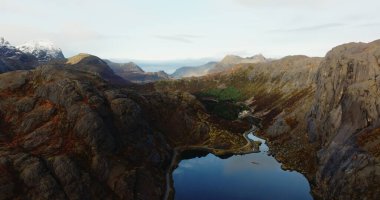 Above the Arctic Circle: Nusfjords Rugged Terrain - Lofotens Hidden Fjord. High quality 4k footage clipart