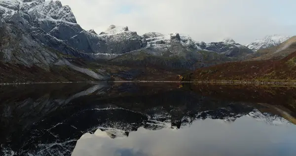 stock image Mirror of Nature: Pristine Mountain Lake in Lofoten. High quality 4k footage