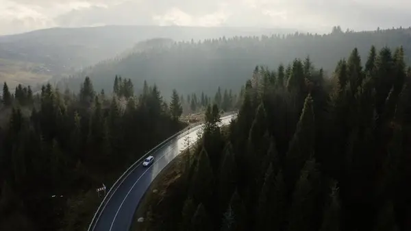 stock image Aerial View of a Serene Mountain Road in the Carpathians. High quality 4k footage