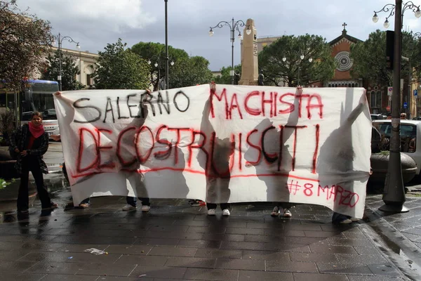 stock image Salerno,SA,Italy-March 08,2023:On the day of the International Womens Day, students and volunteers took to the streets for a transfemminist procession. Schoolgirls with a banner against the men.