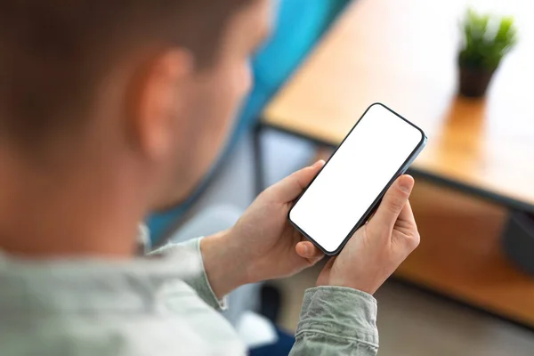 Man Using Smartphone Blank Screen Frameless Modern Design While Sitting — Stock Photo, Image