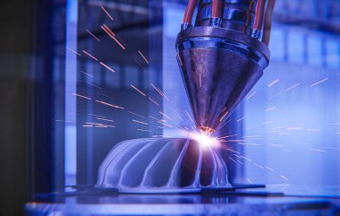 Modern bir 3D yazıcı metal bir türbin basıyor. Makine parçası imalatının geleceği.