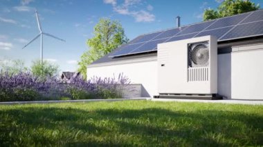 Tek bir aile evinin çatısına fotovoltaik paneller yerleştirilmiş bir ısı pompası ve garajın üzerindeki çimlerle kaplı yeşil bir çatı, mülkiyet için çevre dostu bir ısıtma ve havalandırma çözeltisi oluşturuyor.