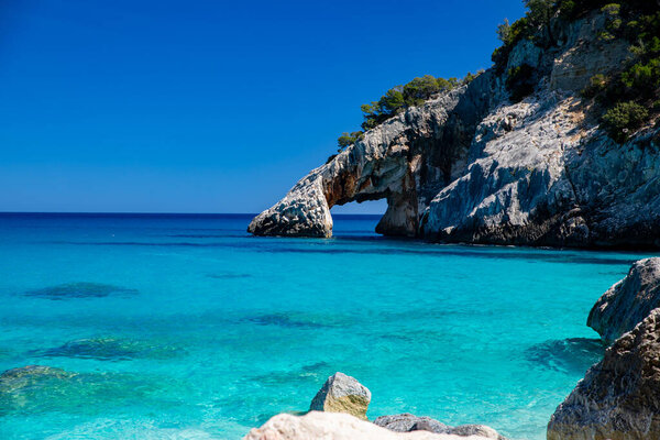 Cala Goloritze, an azure beach located in the town of Baunei, in the southern part of the Gulf of Orosei, in the Ogliastra region of Sardinia.
