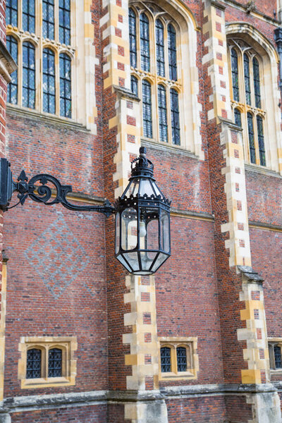 London, UK - July 29, 2023: English architecture Tudors time, West Front of Hampton court with entrance gate, locates in West London
