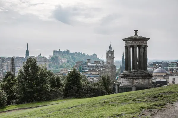 stock image Edinburg, UK - August 23, 2022: Edinburg view from Calton hill. View include Edinburg castle, Balmoral hotel tower, Dugald Stewart Monument