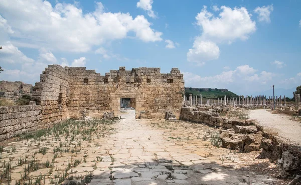 Perge, Old Gate tower and ruins of market square on the sides. Greek colony from 7th century BC, conquered by Persians and Alexander the Great in 334 BC.