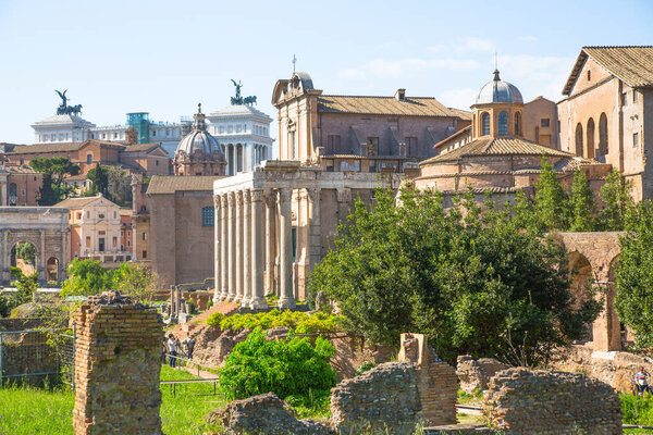ROME, ITALY - APRIL 6, 2024: Roman's forum with ruins of important ancient government buildings, temples, terms and triumphal arch,  started 7th century BC