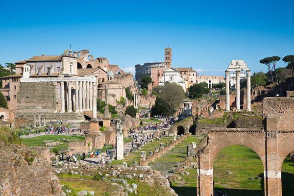 ROME, ITALY - APRIL 8, 2024: Rome forum with ruins of important ancient government buildings, temple ruins and ancient roads started 7th century BC
