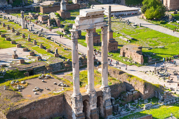 ROME, ITALY - APRIL 8, 2024: Rome forum with ruins of important ancient government buildings, temple ruins and ancient roads started 7th century BC. View From Palatine Hill