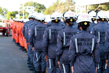 simoes filho, bahia, brazil - november 11, 2022: Military firefighters from Bahia do training at a barracks in the city of Simoes Filho. clipart