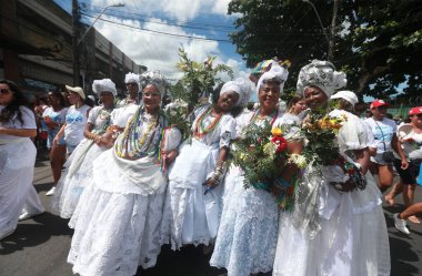 salvador, bahia, brazil - january 12, 2023: baianas participate in the procession of Lavagem do Bonfim in the city of Salvador.