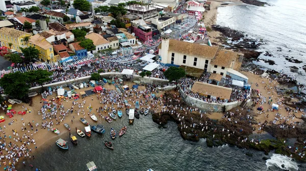 stock image salvador, bahia, brazil - february 2, 2023: Candoble supporters and Orixa Iemanja supporters visit Rio Vermelho beach in Salvador, during festivities in honor of the Queen of the Sea.