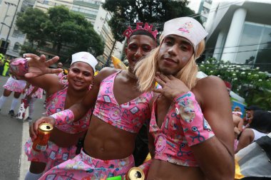 salvador, bahia, brazil - february 20, 2023: members of the carnival block As Muquiranas are seen during the carnival in the city of Salvador