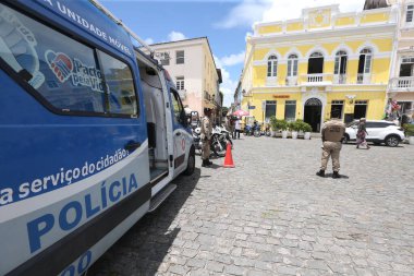 salvador, bahia, brazil - february 1, 2023: Bahia Military Police agent provides security for tourists disembarking from a cruise ship in the port of Salvador.