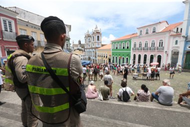 salvador, bahia, brazil - february 1, 2023: Bahia Military Police agent provides security for tourists disembarking from a cruise ship in the port of Salvador.