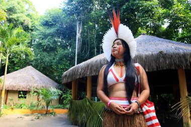 porto seguro, bahia, brazil - august 1, 2023: Etina Pataxo Indians seen during the Aragwaka festival in the Jaqueira village in the city of Porto Seguro. clipart