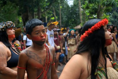 porto seguro, bahia, brazil - august 1, 2023: Etina Pataxo Indians seen during the Aragwaka festival in the Jaqueira village in the city of Porto Seguro. clipart