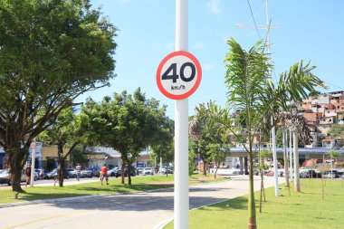 salvador, bahia, brazil may 2, 2024: traffic signs indicate a speed limit of 40 kilometers per hour on roads in the city of Salvador. clipart