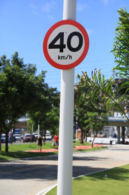 salvador, bahia, brazil may 2, 2024: traffic signs indicate a speed limit of 40 kilometers per hour on roads in the city of Salvador. clipart