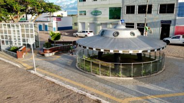 morro do chepeu, bahia, brazil - april 27, 2024: flying saucer displayed on a street in the city of Morro do Chapeu. clipart