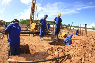 ilheus, bahia, brazil - may 23, 2022: pile driving equipment during foundations in a construction in the city of Ilheus. clipart