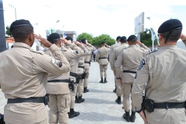 Jpilao arcado, bahia, brazil - november 13, 2024: platoon of the military police of Bahia is seen in the city of Pilao Arcado. clipart