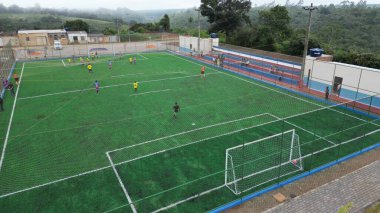 bonito, bahia, brazil - april 28, 2024: view of a football field with synthetic grass in the city of Bonito. clipart