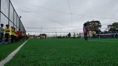 bonito, bahia, brazil - april 28, 2024: view of a football field with synthetic grass in the city of Bonito. clipart