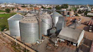 luiz eduardo magalhaes, bahia, brazil - november 30, 2024: aerial view of a silage shed for grain storage after harvest in Bahia. clipart