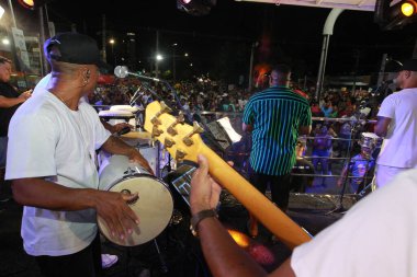 salvador, bahia, brazil - april 23, 2023: precursion band during micareta in the city of Feira de Santana. clipart