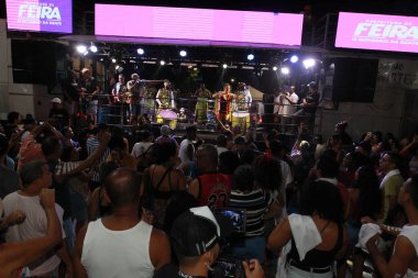 salvador, bahia, brazil - april 23, 2023: precursion band during micareta in the city of Feira de Santana. clipart