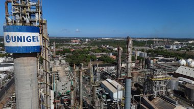 camacari, bahia, brazil - december 26, 2024: aerial view of a factory in the industrial hub of the city of Camacari. clipart