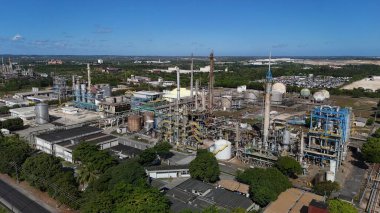 camacari, bahia, brazil - december 26, 2024: aerial view of a factory in the industrial hub of the city of Camacari. clipart