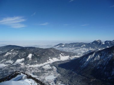 Mountain hiking at Brecherspitze mountain in wintertime, Bavaria, Germany clipart