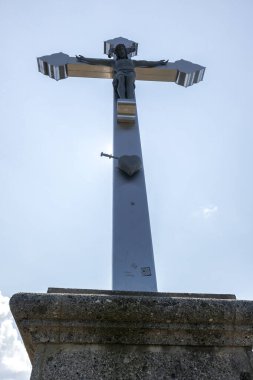 Summit cross of Bodenschneid mountain, Bavaria, Germany,  in springtime clipart