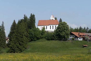 Auerberg, St. Peter and Paul church, Munich Way of St. James, Bavaria, Germany in summertime clipart